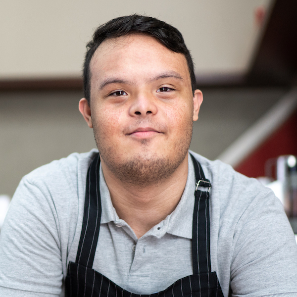 Young person wearing an apron